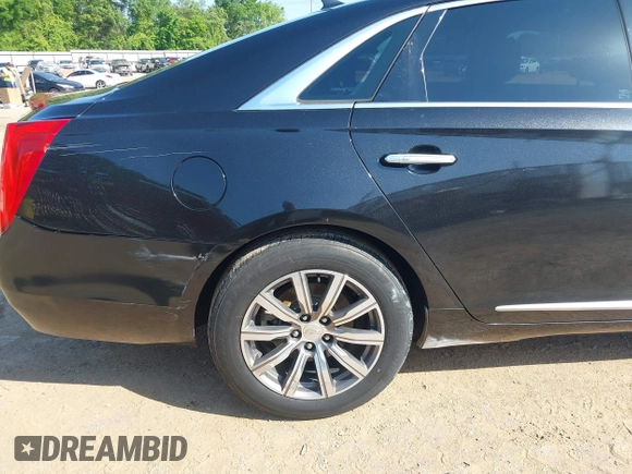 2013 Cadillac XTS Premium z VIN 2G61S5S34D9127996, wystawiony jako IAAI lot #41978539 z przebiegiem 185 157 mil mil oraz . Historia ofert i sprzedaży dostępna na DreamBid. Obrazek 17.