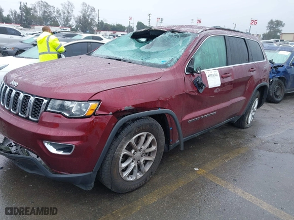 2021 Jeep Grand Cherokee Laredo X with VIN 1C4RJEAG4MC681989, listed as a IAAI auction lot 41571341 with 61,090 mi miles. Bid and sale history available at carsss.com. Image 17.