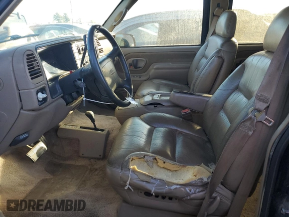 1997 GMC Yukon with VIN 1GKEK13R4VJ752757, listed as a Copart auction lot 75574214 with 251,193 mi miles and Clean Title. Bid and sale history available at carsss.com. Image 7.