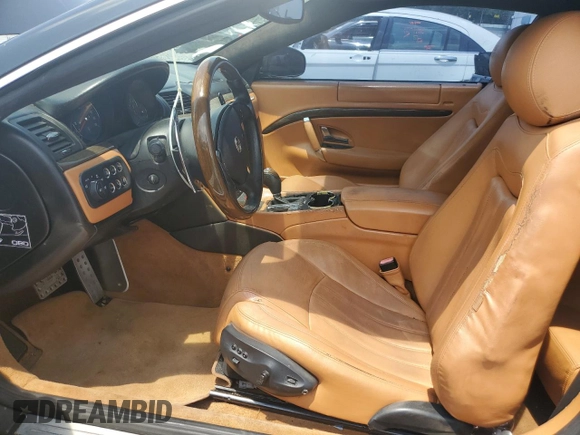 2011 Maserati GranTurismo S with VIN ZAM45KLA9B0059436, listed as a Copart auction lot 55851475 with Not provided miles and Clean title. Bid and sale history available at DreamBid. Image 7.
