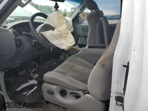 2002 Ford F-150 XL with VIN 1FTRX17L72NB60083, listed as a Copart auction lot 63627985 with Not provided miles and Salvage title. Bid and sale history available at DreamBid. Image 7.