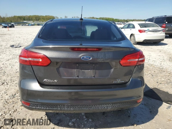 2015 Ford Focus SE with VIN 1FADP3F28FL341666, listed as a Copart auction lot 56338705 with 134,976 mi miles and Clean title. Bid and sale history available at DreamBid. Image 6.