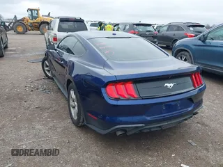 2019 Ford Mustang EcoBoost with VIN 1FA6P8TH8K5185349, listed as a IAAI auction lot 41554974 with 30,023 mi miles and . Bid and sale history available at carsss.com. Image 3.