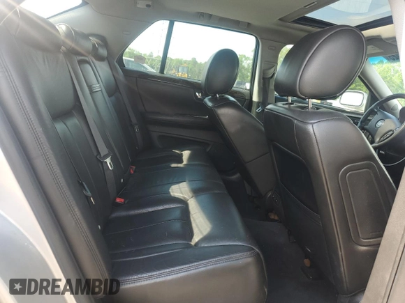 2009 Cadillac DTS 1SA z VIN 1G6KD57Y19U136085, wystawiony jako Copart lot #56983425 z przebiegiem 115 468 mil mil oraz Czysty tytuł • Clean title. Historia ofert i sprzedaży dostępna na DreamBid. Obrazek 10.