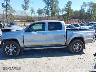 2014 Toyota Tacoma PreRunner with VIN 5TFJU4GNXEX061808, listed as a IAAI auction lot 41585931 with 214,240 mi miles. Bid and sale history available at carsss.com. Image 14.