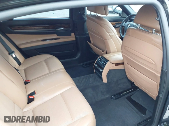 2014 BMW 7 Series 740Li with VIN WBAYE4C51ED138744, listed as a IAAI auction lot 42254213 with 116,157 mi miles and . Bid and sale history available at DreamBid. Image 8.
