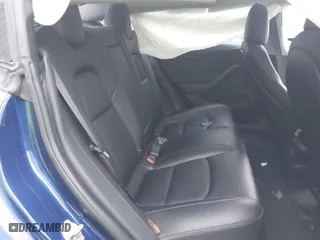 2018 Tesla Model 3 Long Range Battery with VIN 5YJ3E1EB2JF180275, listed as a IAAI auction lot 41196064 with 110,535 mi miles. Bid and sale history available at carsss.com. Image 8.