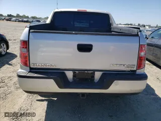 2009 Honda Ridgeline RT with VIN 2HJYK16259H502471, listed as a Copart auction lot 62337754 with 128,328 mi miles and Salvage Title. Bid and sale history available at carsss.com. Image 6.