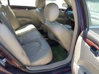 2009 Buick Lucerne CXL with VIN 1G4HD57M09U129435, listed as a IAAI auction lot 41950701 with 202,100 mi miles and . Bid and sale history available at DreamBid. Image 8.