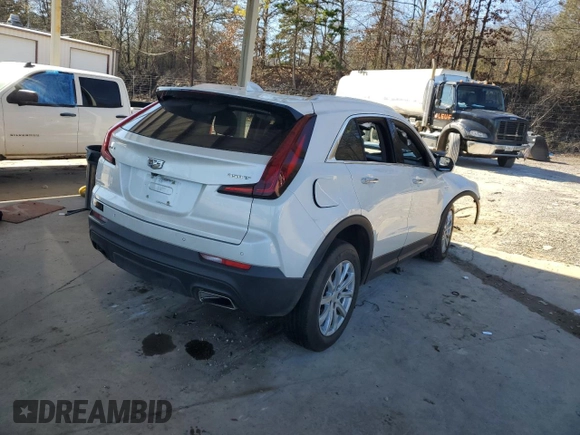 2021 Cadillac XT4 FWD Luxury с VIN 1GYAZAR47MF023407, выставлен на аукционе Copart как лот 88633325 с пробегом 77 353 миль миль и Списание • Salvage title. История ставок и продаж доступна на DreamBid. Изображение 3.