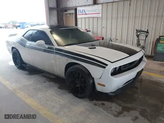 2011 Dodge Challenger with VIN 2B3CJ4DGXBH558348, listed as a IAAI auction lot 41532603 with 127,551 mi miles. Bid and sale history available at carsss.com. Image 1.