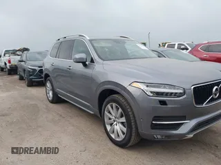 2016 Volvo XC90 T6 Momentum z VIN YV4A22PK5G1055854, wystawiony jako IAAI lot #41915279 z przebiegiem 88 237 mil mil oraz . Historia ofert i sprzedaży dostępna na DreamBid. Obrazek 1.