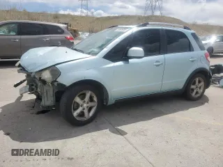 2009 Suzuki SX4 Touring AWD z VIN JS2YB417396203092, wystawiony jako Copart lot #53965685 z przebiegiem 153 701 mil mil oraz Szkoda całkowita • Salvage title. Historia ofert i sprzedaży dostępna na DreamBid. Obrazek 1.