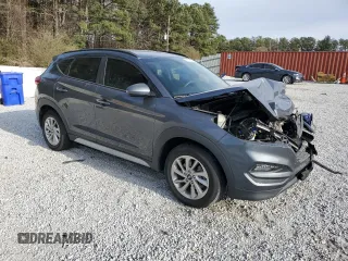 2017 Hyundai Tucson SE with VIN KM8J33A42HU544398, listed as a Copart auction lot 47004675 with 74,561 mi miles and Salvage Title. Bid and sale history available at DreamBid. Image 4.