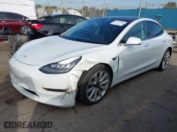 2020 Tesla Model 3 Long Range with VIN 5YJ3E1EB9LF620771, listed as a IAAI auction lot 41795008 with 53,155 mi miles and . Bid and sale history available at DreamBid. Image 19.