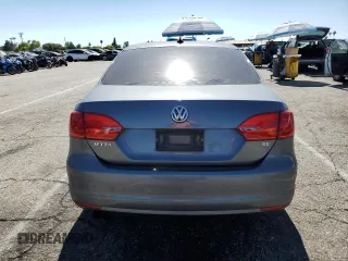 2014 Volkswagen Jetta SE with VIN 3VWD17AJ2EM322087, listed as a Copart auction lot 62571155 with 71,884 mi miles and Salvage title. Bid and sale history available at DreamBid. Image 6.