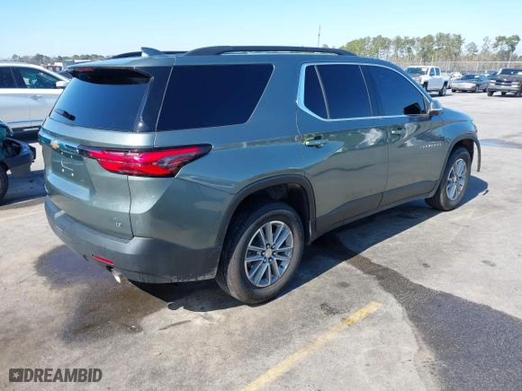 2022 Chevrolet Traverse LT Leather with VIN 1GNEVHKWXNJ141805, listed as a IAAI auction lot 41641352 with 71,504 mi miles. Bid and sale history available at carsss.com. Image 4.