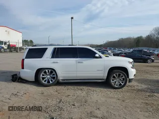 2015 Chevrolet Tahoe LTZ z VIN 1GNSKCKC5FR177134, wystawiony jako IAAI lot #41460583 z przebiegiem 202 924 mil mil oraz . Historia ofert i sprzedaży dostępna na DreamBid. Obrazek 13.