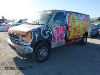 2002 Ford Econoline Cargo with VIN 1FTNE24L42HB67506, listed as a IAAI auction lot 42056517 with 197,394 mi miles and . Bid and sale history available at DreamBid. Image 2.