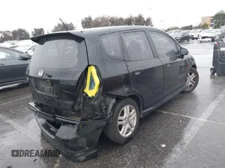 2007 Honda Fit Sport with VIN JHMGD38637S040129, listed as a IAAI auction lot 41579352 with 230,962 mi miles. Bid and sale history available at carsss.com. Image 4.