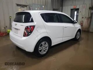 2014 Chevrolet Sonic LT with VIN 1G1JC6SH6E4239708, listed as a Copart auction lot 85530104 with 123,912 mi miles and Salvage Title. Bid and sale history available at carsss.com. Image 3.