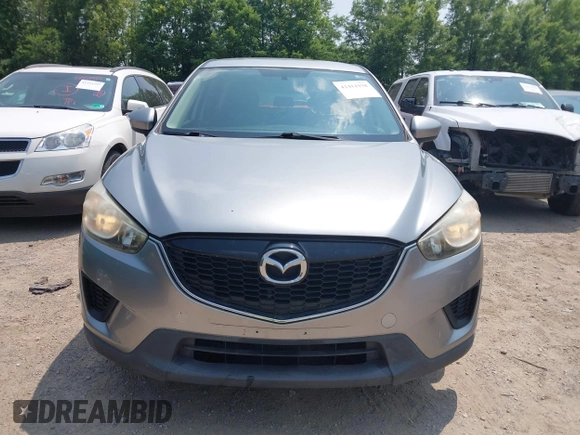 2014 Mazda CX-5 Sport with VIN JM3KE4BE9E0411177, listed as a IAAI auction lot 42411938 with 167,709 mi miles and . Bid and sale history available at DreamBid. Image 12.