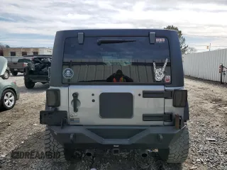 2014 Jeep Wrangler Unlimited Sport with VIN 1C4BJWDG3EL108151, listed as a Copart auction lot 49862315 with 104,417 mi miles and Salvage Title. Bid and sale history available at carsss.com. Image 6.