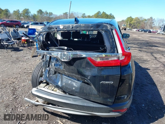 2019 Honda CR-V EX with VIN 2HKRW2H5XKH674504, listed as a IAAI auction lot 41823838 with 104,281 mi miles. Bid and sale history available at carsss.com. Image 15.
