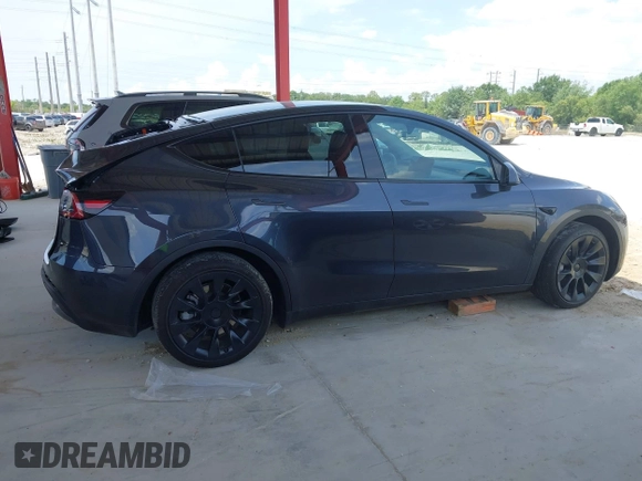 2024 Tesla Model Y Long Range z VIN 7SAYGDEE7RA229591, wystawiony jako IAAI lot #42194044 z przebiegiem 22 866 mil mil oraz . Historia ofert i sprzedaży dostępna na DreamBid. Obrazek 13.
