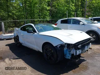 2021 Ford Mustang EcoBoost with VIN 1FA6P8TH6M5148562, listed as a IAAI auction lot 42147236 with 57,050 mi miles and . Bid and sale history available at DreamBid. Image 1.