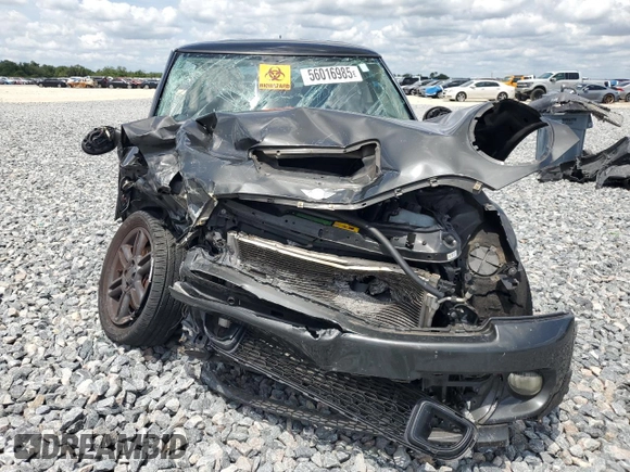 2011 MINI Hardtop S with VIN WMWSV3C55BTY20530, listed as a Copart auction lot 56016985 with Not Provided miles and Salvage Title. Bid and sale history available at DreamBid. Image 5.