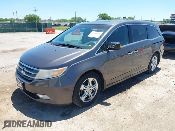 2012 Honda Odyssey Touring with VIN 5FNRL5H93CB109394, listed as a IAAI auction lot 42280018 with 190,412 mi miles and . Bid and sale history available at DreamBid. Image 17.