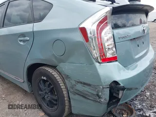 2012 Toyota Prius One z VIN JTDKN3DU4C1587830, wystawiony jako IAAI lot #42204822 z przebiegiem 98 401 mil mil oraz . Historia ofert i sprzedaży dostępna na DreamBid. Obrazek 6.
