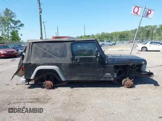 2005 Jeep Wrangler Unlimited with VIN 1J4FA44S25P385421, listed as a IAAI auction lot 42039381 with 1 mi miles. Bid and sale history available at carsss.com. Image 12.