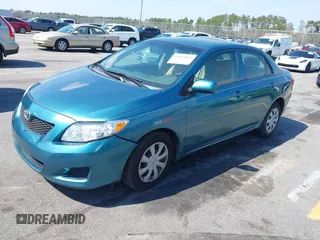 2010 Toyota Corolla with VIN 1NXBU4EE7AZ216331, listed as a IAAI auction lot 41811069 with 235,599 mi miles. Bid and sale history available at carsss.com. Image 2.