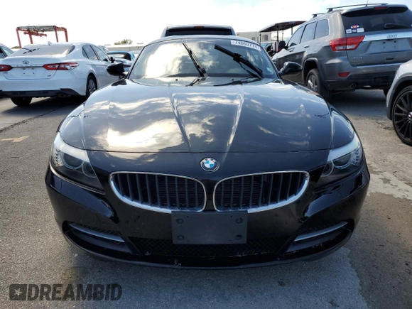 2013 BMW Z4 sDrive28i with VIN WBALL5C54DJ103864, listed as a Copart auction lot 74069774 with 36,161 mi miles and Salvage Title. Bid and sale history available at carsss.com. Image 5.