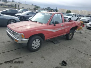 1990 Toyota Pickup DX z VIN JT4RN81P1L5069080, wystawiony jako Copart lot #81606084 z przebiegiem 168 115 mil mil oraz Szkoda całkowita • Salvage title. Historia ofert i sprzedaży dostępna na DreamBid. Obrazek 1.