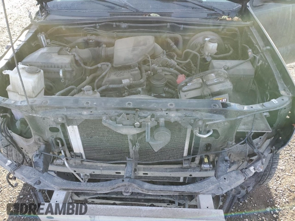 2013 Toyota Tacoma z VIN 5TFPX4EN7DX015095, wystawiony jako Copart lot #84664074 z przebiegiem 188 709 mil mil oraz Szkoda całkowita • Salvage title. Historia ofert i sprzedaży dostępna na DreamBid. Obrazek 11.