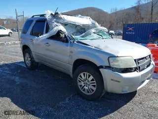 2007 Mercury Mariner Luxury with VIN 4M2YU91157KJ13700, listed as a IAAI auction lot 41616980 with 242,497 mi miles. Bid and sale history available at carsss.com. Image 1.