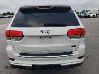 2015 Jeep Grand Cherokee Summit with VIN 1C4RJEJG8FC131925, listed as a Copart auction lot 55270785 with 130,425 mi miles and Salvage title. Bid and sale history available at DreamBid. Image 6.