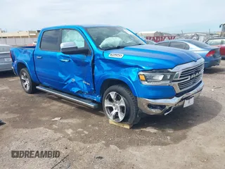 2021 Ram 1500 Laramie z VIN 1C6SRFJT1MN774879, wystawiony jako IAAI lot #42242318 z przebiegiem 51 971 mil mil oraz . Historia ofert i sprzedaży dostępna na DreamBid. Obrazek 1.