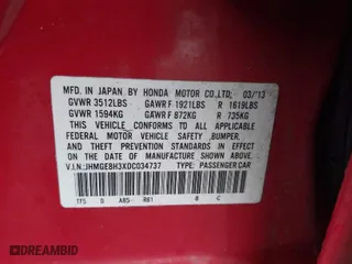2013 Honda Fit with VIN JHMGE8H3XDC034737, listed as a IAAI auction lot 41865531 with 91,747 mi miles. Bid and sale history available at carsss.com. Image 9.