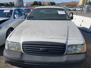 2000 Ford Crown Victoria Police Interceptor z VIN 2FAFP71W7YX104263, wystawiony jako IAAI lot #42442496 z przebiegiem 153 064 mil mil oraz . Historia ofert i sprzedaży dostępna na DreamBid. Obrazek 6.