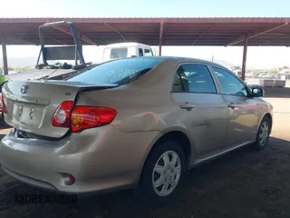 2010 Toyota Corolla with VIN 1NXBU4EE9AZ186488, listed as a IAAI auction lot 42422152 with 140,609 mi miles and . Bid and sale history available at DreamBid. Image 4.