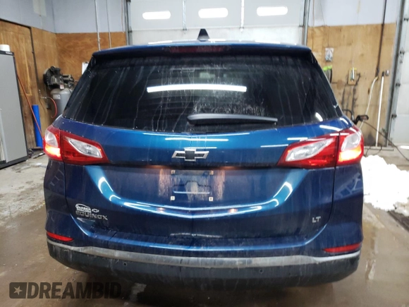 2021 Chevrolet Equinox LT with VIN 3GNAXKEV0ML309645, listed as a Copart auction lot 81958994 with 75,576 mi miles and Salvage Title. Bid and sale history available at DreamBid. Image 6.