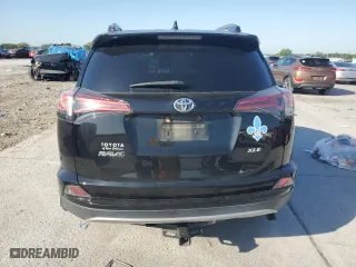 2018 Toyota RAV4 XLE with VIN 2T3WFREV2JW472232, listed as a Copart auction lot 52464025 with 131,421 mi miles and Salvage Title. Bid and sale history available at carsss.com. Image 6.