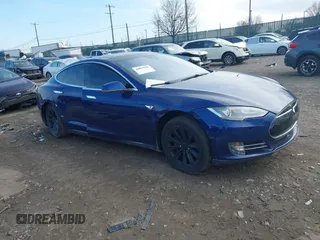 2016 Tesla Model S 90D with VIN 5YJSA1E21GF128362, listed as a IAAI auction lot 40891999 with 179,155 mi miles and . Bid and sale history available at DreamBid. Image 1.