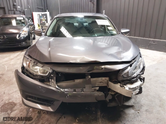 2016 Honda Civic Sedan LX with VIN 2HGFC2F56GH513325, listed as a IAAI auction lot 41972148 with 101,485 mi miles. Bid and sale history available at carsss.com. Image 13.