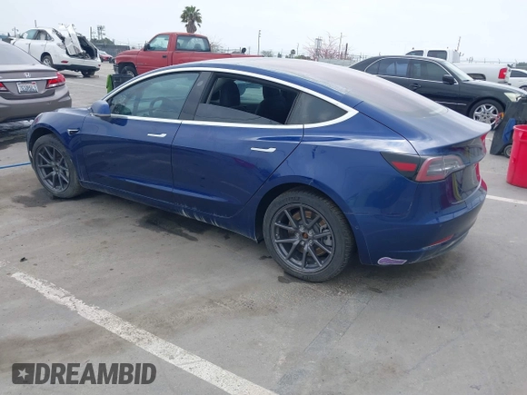 2018 Tesla Model 3 Long Range Battery with VIN 5YJ3E1EA1JF160350, listed as a IAAI auction lot 34606522 with 89,431 mi miles and . Bid and sale history available at DreamBid. Image 3.