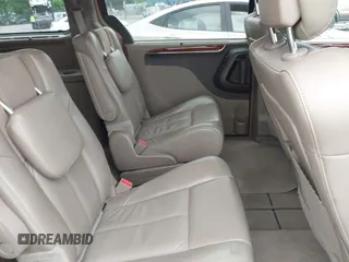 2013 Chrysler Town & Country Limited z VIN 2C4RC1GG0DR809789, wystawiony jako IAAI lot #42375930 z przebiegiem 102 545 mil mil oraz . Historia ofert i sprzedaży dostępna na DreamBid. Obrazek 8.
